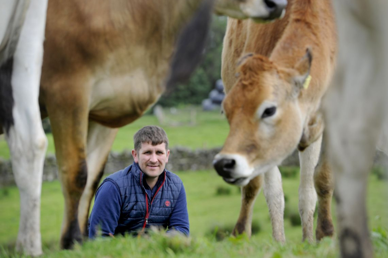 Andrew Jardine, tenant at New Farm on the Applegirth Estate, watches his cattle grazing